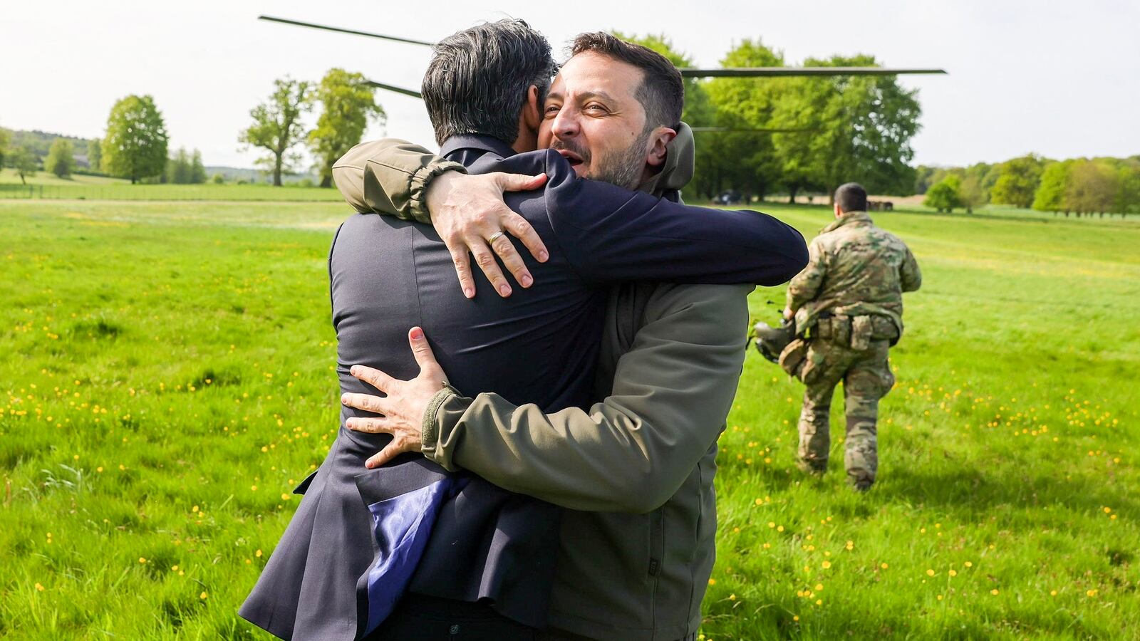 Rishi Sunak and Volodymyr Zelensky embrace.