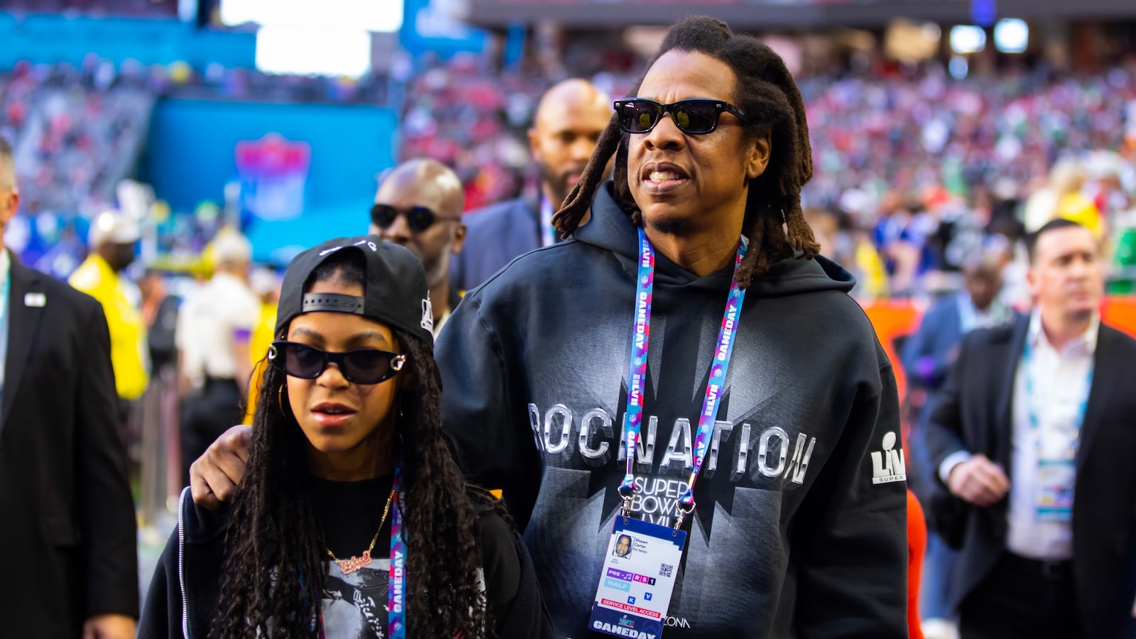Jay-Z and daughter Blue Ivy on the sideline before Super Bowl LVII