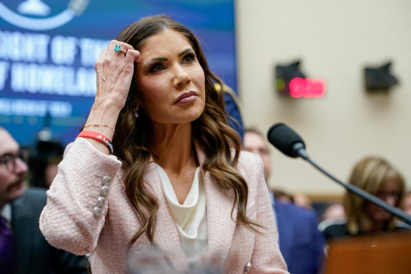 U.S. Homeland Security Secretary Kristi Noem wears a wristband in support of the non-profit organization Lost Voices of Fentanyl as she attends a House Judiciary Committee hearing on "Oversight of the Department of Homeland Security" to testify, on Capitol Hill in Washington, D.C., U.S., March 4, 2026.