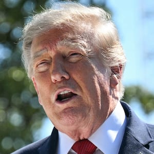 US President Donald Trump speaks to the press about ongoing construction of a helipad and other projects on the South Lawn of the White House in Washington, DC, on August 19, 2026.