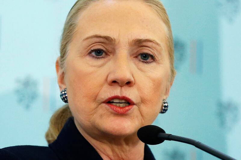 articles/2012/12/03/u-s-warns-on-assad-about-use-of-chemical-weapons/telegraph-syria-clinton-tease_lz46b3