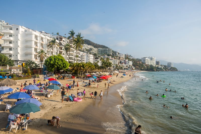 MEXICO - 2025/04/28: Beach scene at the Playa de los Muertos in the Romantic Zone of Puerto Vallarta, also known as Viejo Vallarta (Old Town) or Zona Romantica, in Puerto Vallarta, Jalisco state, Mexico. (Photo by Wolfgang Kaehler/LightRocket via Getty Images)