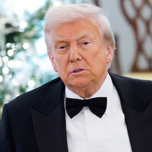 WASHINGTON, DC - DECEMBER 06: U.S. President Donald Trump (R) talks with U.S. Secretary of State Marco Rubio (L) before delivering remarks at the State Department Kennedy Center Honors medal presentation dinner at the U.S. Department of State on December 06, 2025 in Washington, DC. The 2025 Kennedy Center Honorees are Sylvester Stallone, George Strait, the rock band KISS, Gloria Gaynor, and Michael Crawford. (Photo by Aaron Schwartz/Getty Images)
