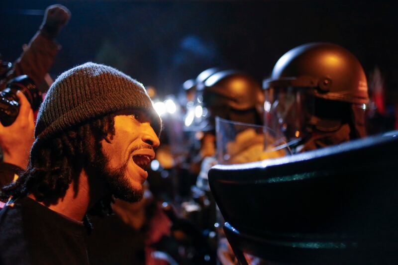 galleries/2014/11/24/fury-at-the-ferguson-decision-photos/141125-ferguson-reactions-03_rqkjrv
