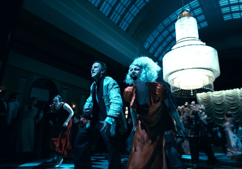 (L-R) Christian Bale as Frank and Jessie Buckley as The Bride.