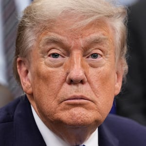U.S. President Donald Trump looks on as he sits in the Oval Office of the White House in Washington, D.C., U.S., June 26, 2026. REUTERS/Ken Cedeno