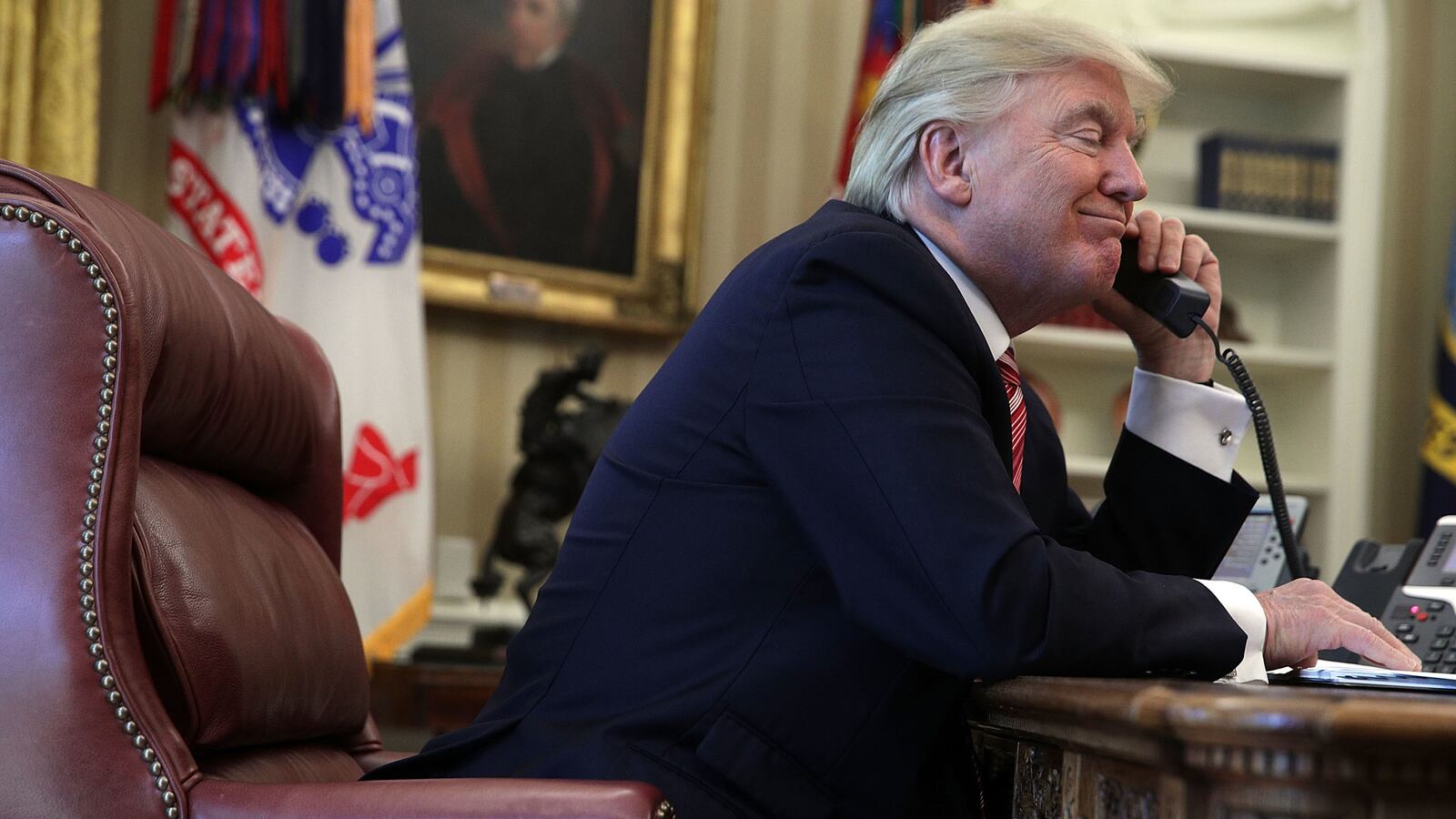 U.S. President Donald Trump speaks on the phone with Irish Prime Minister Leo Varadkar on the phone in the Oval Office of the White House June 27, 2017