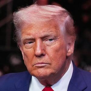 U.S. President Donald Trump attends the UFC-316 mixed martial arts event, at the Prudential Center, Saturday, June 7, 2025, in Newark, N.J., as UFC’s Dana White, looks on.   Frank Franklin II/Pool via REUTERS