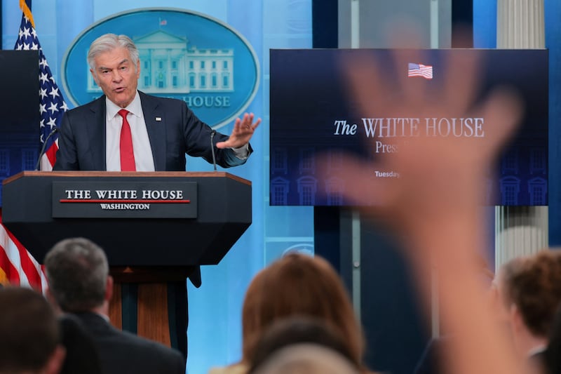 A hand is raised by a member of the media as U.S. Administrator for the Centers for Medicare & Medicaid Services Mehmet Oz holds a press briefing at the White House in Washington, D.C., U.S., June 2, 2026. REUTERS/Jonathan Ernst