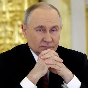 Russian President Vladimir Putin attends an annual meeting