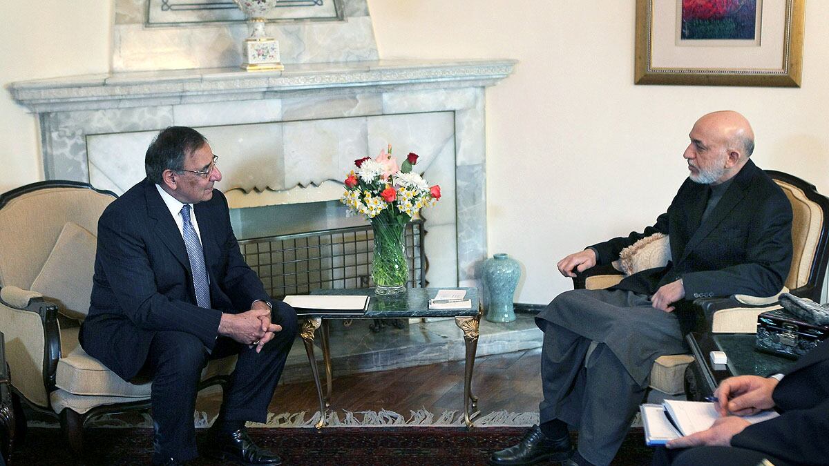 articles/2012/03/15/afghanistan-s-karzai-and-taliban-to-u-s-go-away-and-shut-up/karzai-panetta-afghanistan-cheat_i906xb