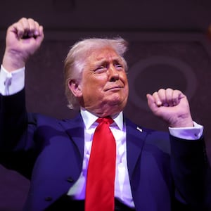 President Donald Trump dances to the final performance of the Village People during the FIFA World Cup 2026 Official Draw at John F. Kennedy Center for the Performing Arts on December 05, 2025 in Washington, DC.