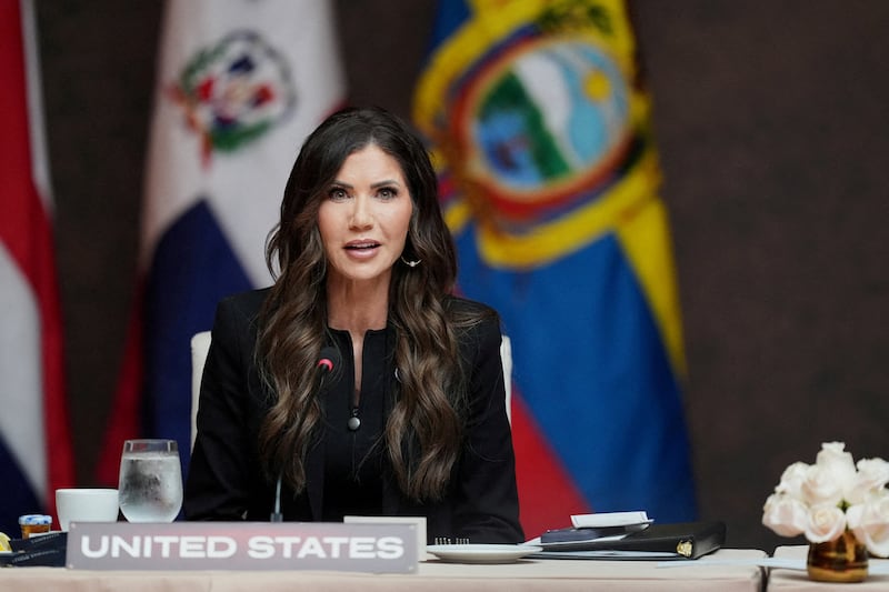 Kristi Noem delivers remarks at a working lunch at the Shield of the Americas Summit at Trump National Doral Miami, in Doral, Florida, U.S., March 7, 2026.