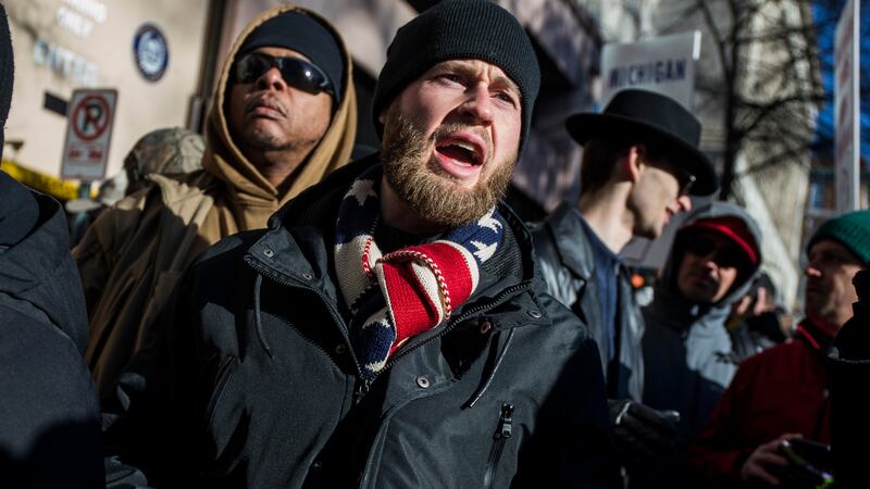 RICHMOND, VA - JANUARY 20:  InfoWars host Owen Shroyer speaks during a rally organized by The Virginia Citizens Defense League on Capitol Square near the state capitol building on January 20, 2020 in Richmond, Virginia. During elections last year, Virginia Governor Ralph Northam promised to enact sweeping gun control laws in 2020, including limiting handgun purchase to one per month, banning military-style weapons and silencers, allowing localities to ban guns in public spaces and enacting a 'red flag' law so authorities can temporarily seize weapons from someone deemed a threat. While event organizers have asked supporters to show up un-armed, militias and other far-right groups from across the country plan to attend the rally and show their support for gun rights.