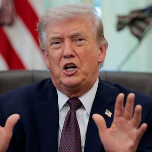 U.S. President Donald Trump speaks during the signing ceremony for an executive order on mail ballots, in the Oval Office of the White House in Washington, D.C., March 31, 2026.