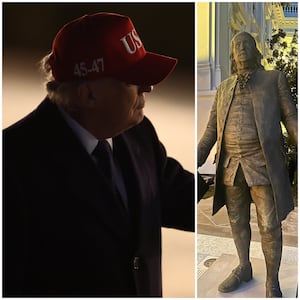 Trump and one of the statues.