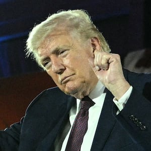 President Donald Trump dances after speaking at the National Republican Congressional Committee's annual President's Dinner at Union Station in Washington, DC on March 25, 2026.