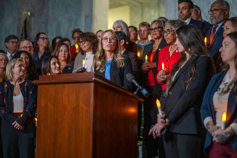 TOPSHOT - Annie Farmer, victim of convicted sex offender Jeffrey Epstein, speaks from the podium during a candlelight vigil to honor survivors of his crimes in Washington, DC on November 18, 2025. The US Senate on Tuesday approved a House-passed bill ordering the release of federal files on Jeffrey Epstein, the disgraced financier whose extensive alleged sex trafficking network fueled one of the country's most incendiary scandals. (Photo by DANIEL HEUER / AFP) (Photo by DANIEL HEUER/AFP via Getty Images)