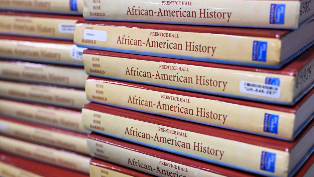 Books are piled up in the classroom for students taking AP African-American Studies at Overland High School on November 1, 2022 in Aurora, Colorado.