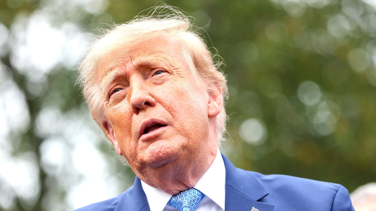 U.S. President Donald Trump holds a press briefing with AI executives following a meeting on artificial intelligence, outside the West Wing of the White House on September 29, 2026 in Washington, DC. The meeting comes as some have called for a slowdown in AI development amid rising safety concerns.