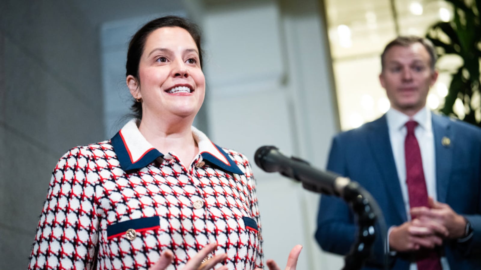 House Republican Conference Chair Elise Stefanik, R-N.Y., speaks as vice chair Rep. Blake Moore, R-Utah, looks on