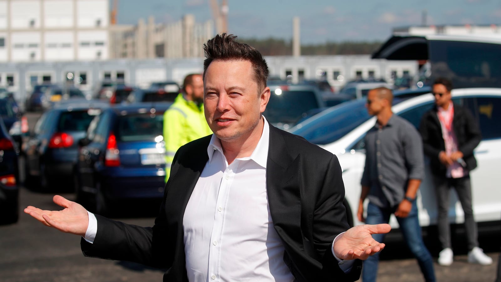 Tesla CEO Elon Musk gestures as he arrives to visit the construction site of the future US electric car giant Tesla, on September 03, 2020 in Gruenheide near Berlin. - Tesla builds a compound at the site in Gruenheide in Brandenburg for its first European "Gigafactory" near Berlin. (Photo by Odd ANDERSEN / AFP) (Photo by ODD ANDERSEN/AFP via Getty Images)