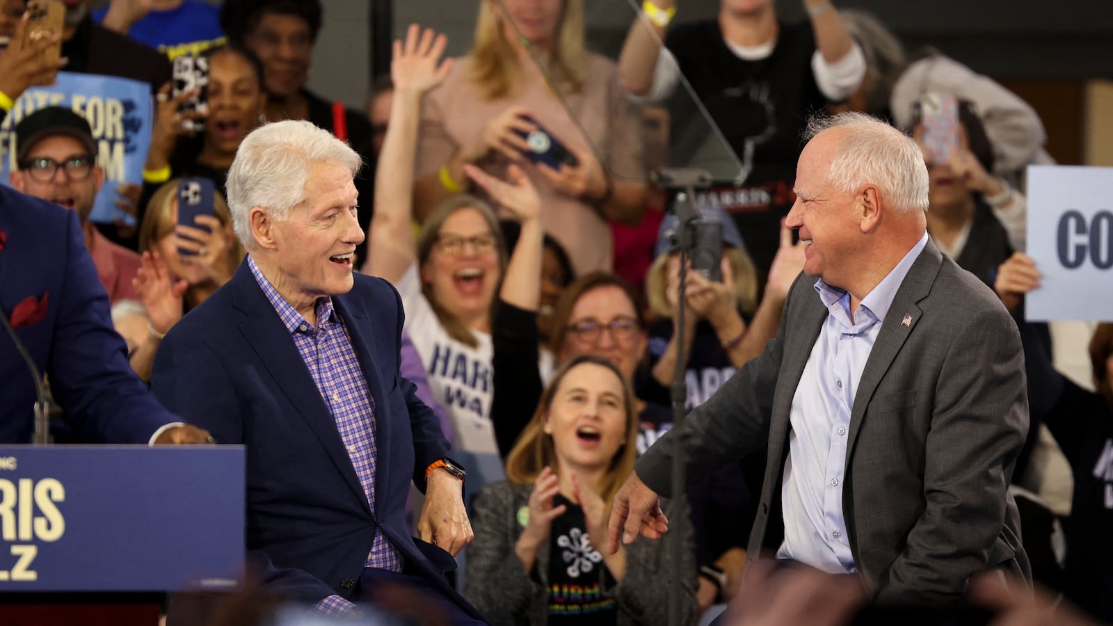 Democratic vice presidential nominee Tim Walz and former President Bill Clinton.