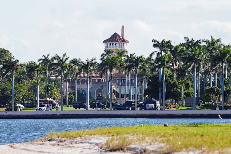 Vehicles of the motorcade of U.S. President Donald Trump are parked at Mar-a-Lago, in Palm Beach, Florida, U.S., November 29, 2025.
