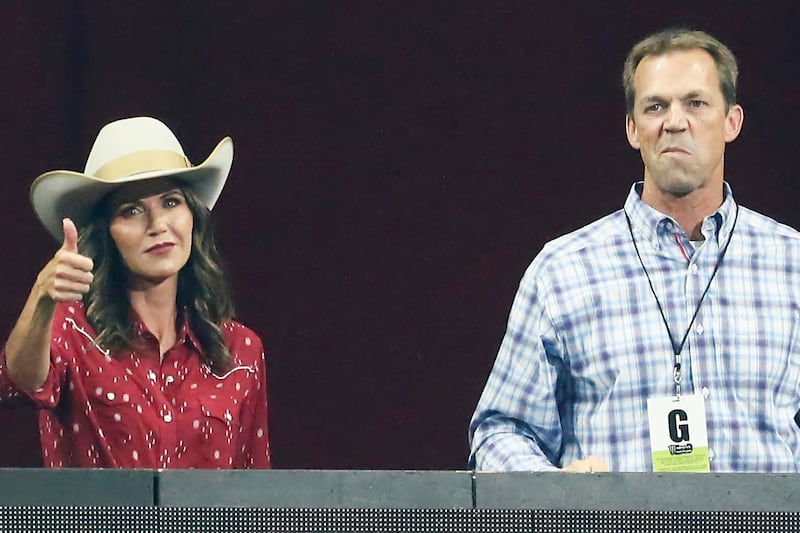 SIOUX FALLS, SD - JULY 11: South Dakota's Governor Kristi Noem looks on next to her husband Bryon Noem during the Monster Energy Team Challenge, on July 11, 2020, at the Denny Sanford PREMIER Center, Sioux Falls, SD. (Photo by Chris Elise/Icon Sportswire via Getty Images)