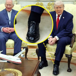 A photo composite of Donald Trump and his cankles with King Charles.