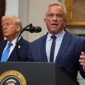 Robert F. Kennedy Jr., joined by President Donald Trump (L) in the Roosevelt Room of the White House on September 22, 2025 in Washington, DC.