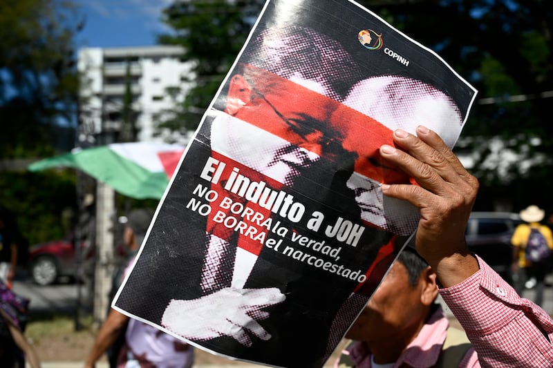 A poster of Juan Orlando Hernandez and Donald Trump