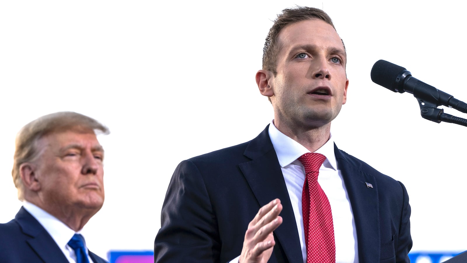 DELAWARE, OH - APRIL 23: (L-R) Former U.S. President Donald Trump listens as Max Miller, Republican candidate for Ohio's 7th congressional district, speaks during a rally hosted by the former president at the Delaware County Fairgrounds on April 23, 2022 in Delaware, Ohio. Last week, Trump announced his endorsement of J.D. Vance in the Ohio Republican Senate primary.