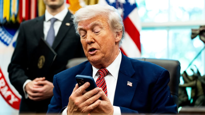 US President Donald Trump silenced his cellphone in the Oval Office of the White House on Friday May 23, 2025. The executive orders were related to the nuclear power industry in the US.