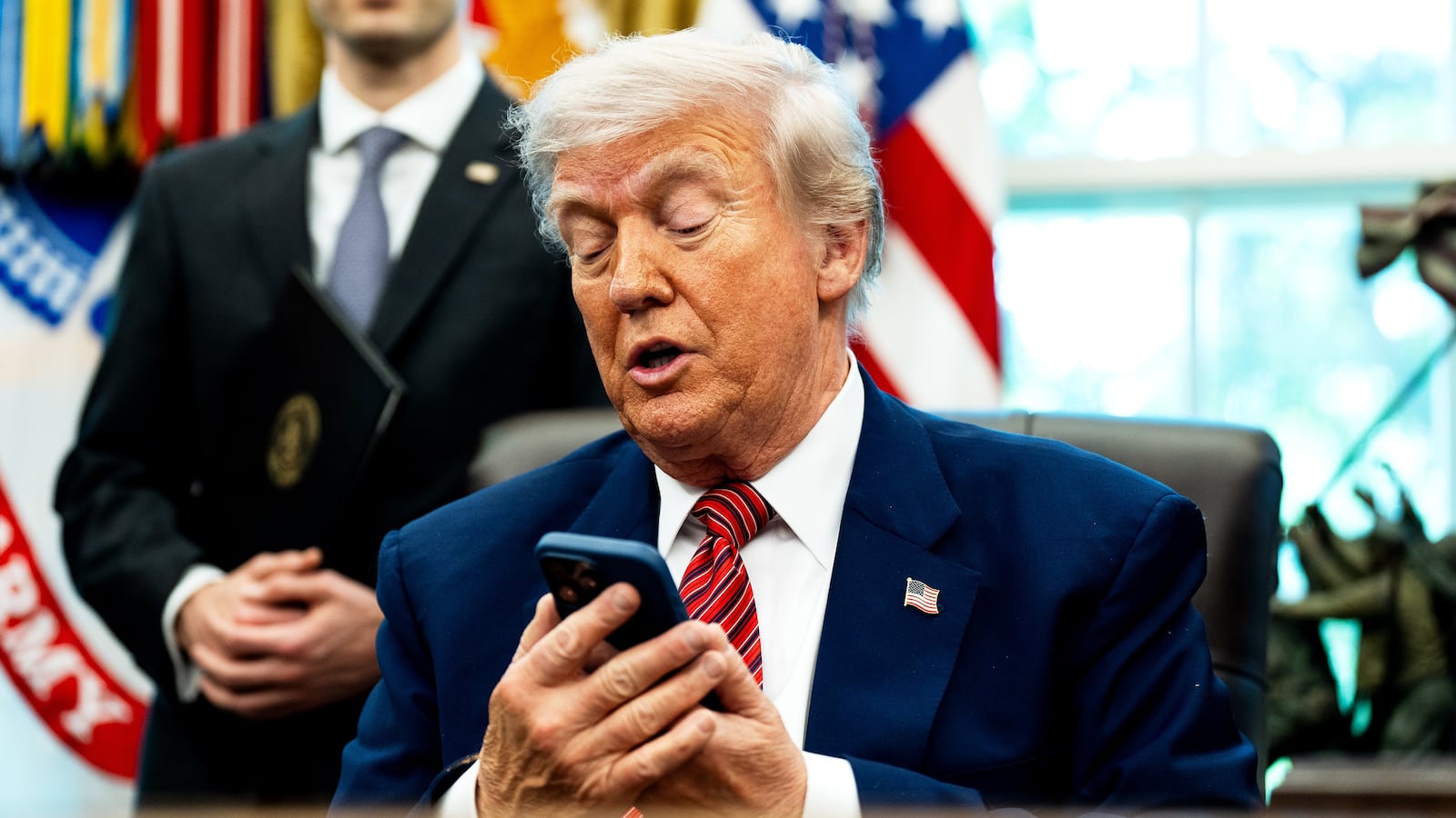 US President Donald Trump silenced his cellphone in the Oval Office of the White House on Friday May 23, 2025. The executive orders were related to the nuclear power industry in the US.