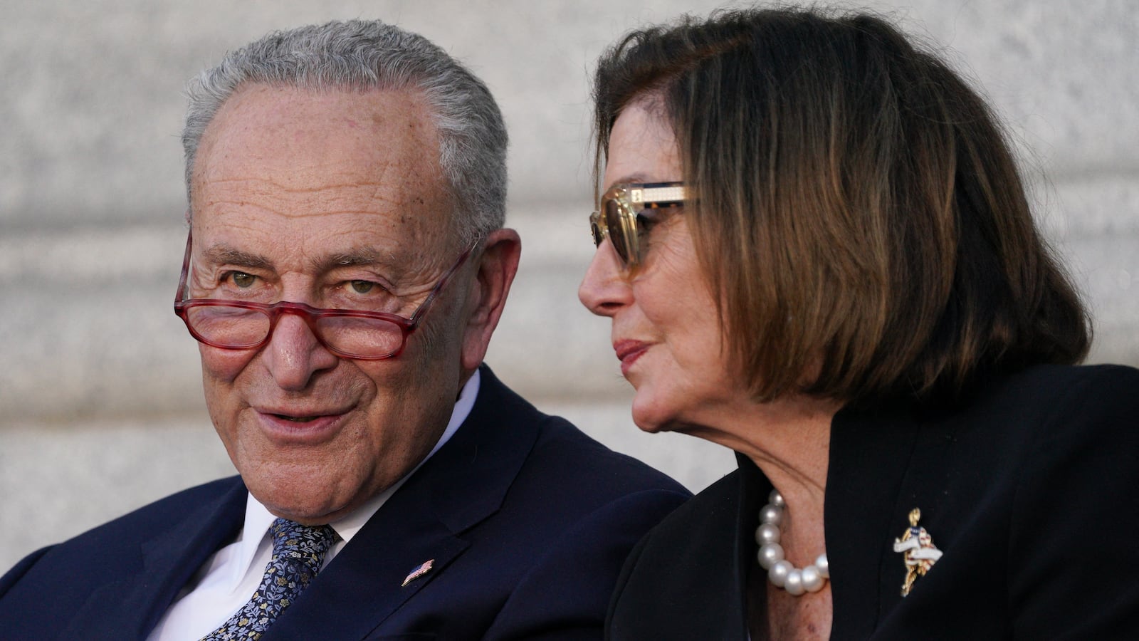 US Senate Majority Leader Chuck Schumer (D-NY) and former House Speaker Nancy Pelosi attend the funeral service of US Senator Dianne Feinstein at San Francisco City Hall on October 5, 2023 in San Francisco, California. Feinstein, a titan of US political history who notched a string of legislative achievements during a trailblazing three-decade career in the Senate, died on September 29, 2023. She was 90. (Photo by Loren Elliott / AFP) (Photo by LOREN ELLIOTT/AFP via Getty Images)