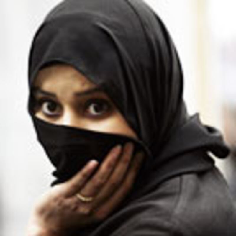 articles/2010/04/11/would-allah-ban-the-veil/khan-veil-ban_93140_npzwkk