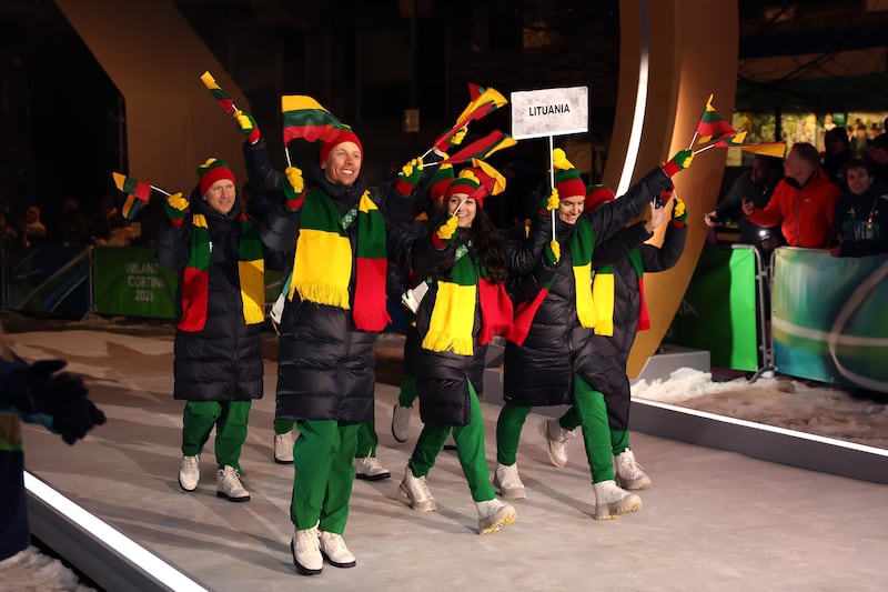 CORTINA D'AMPEZZO, ITALY - FEBRUARY 06: Athletes of Team Lithuania enter the stadium during the opening ceremony of the Milano Cortina 2026 Winter Olympics at Piazza Dibona on February 06, 2026 in Cortina d'Ampezzo, Italy. (Photo by Ezra Shaw/Getty Images)