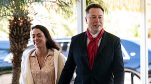 PALM BEACH, FLORIDA - FEBRUARY 1: Elon Musk, CEO of Tesla and SpaceX, and Shivon Zilis, a venture capitalist, arrive at Mar-a-Lago on February 1, 2026 in Palm Beach, Florida. The wedding of Dan Scavino, White House deputy chief of staff, and Erin Elmore, the State Department’s Art in Embassies director, is taking place today at Mar‑a‑Lago.