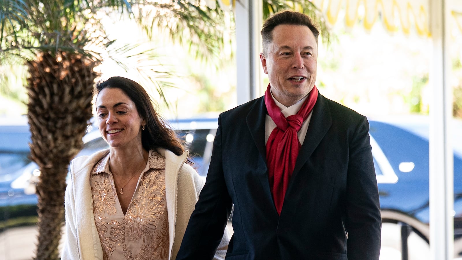 PALM BEACH, FLORIDA - FEBRUARY 1: Elon Musk, CEO of Tesla and SpaceX, and Shivon Zilis, a venture capitalist, arrive at Mar-a-Lago on February 1, 2026 in Palm Beach, Florida. The wedding of Dan Scavino, White House deputy chief of staff, and Erin Elmore, the State Department’s Art in Embassies director, is taking place today at Mar‑a‑Lago.
