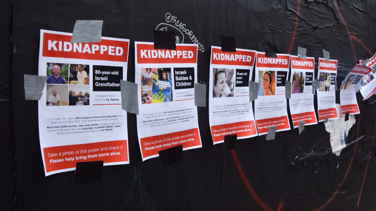 Posters of Israelis purportedly kidnapped by Hamas.