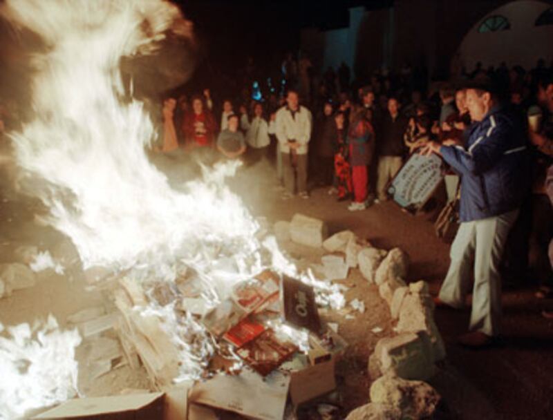 articles/2010/09/07/historys-greatest-book-burners/miller-terry-jones_125112_ohrebx