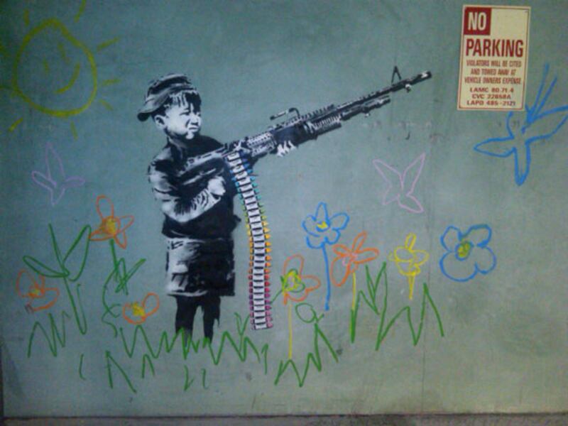galleries/2011/02/18/banksy-takes-los-angeles/banksy-in-la-1_la3gyt
