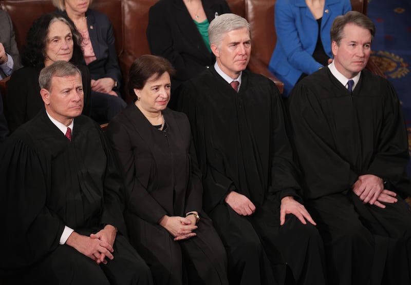 (L-R) Justice John Roberts, Justice Elena Kagan, Justice Neil Gorsuch, Justice Brett Kavanaugh