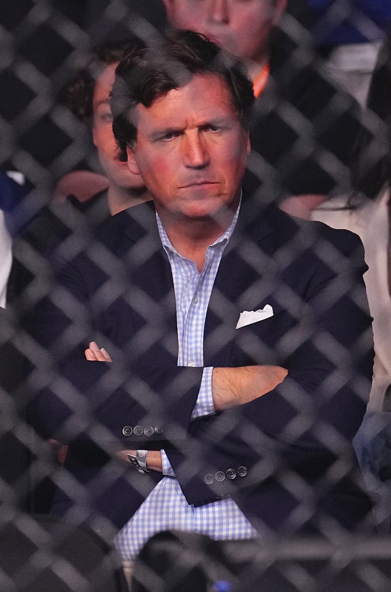 RIYADH, SAUDI ARABIA - FEBRUARY 01: Tucker Carlson looks on during the UFC Fight Night event at anb Arena on February 01, 2025 in Riyadh, Saudi Arabia.  (Photo by Chris Unger/Zuffa LLC)