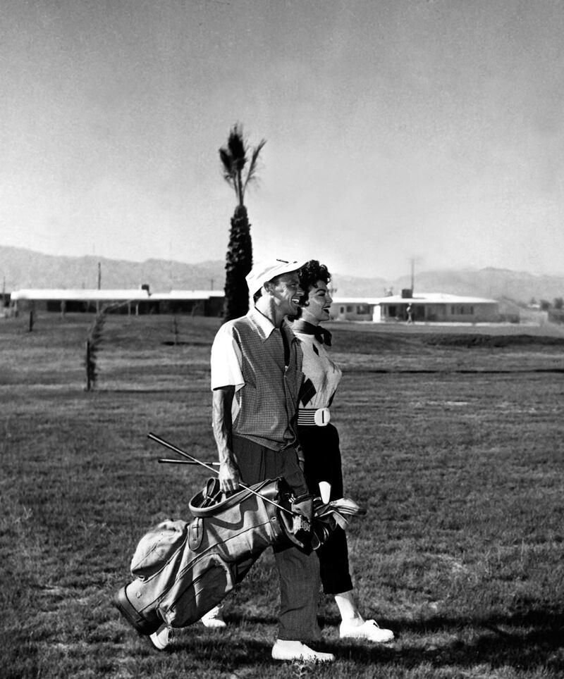 galleries/2013/08/11/old-school-golfing-with-the-stars-photos/celebs-golf-sinatra-gardner_jwp2en