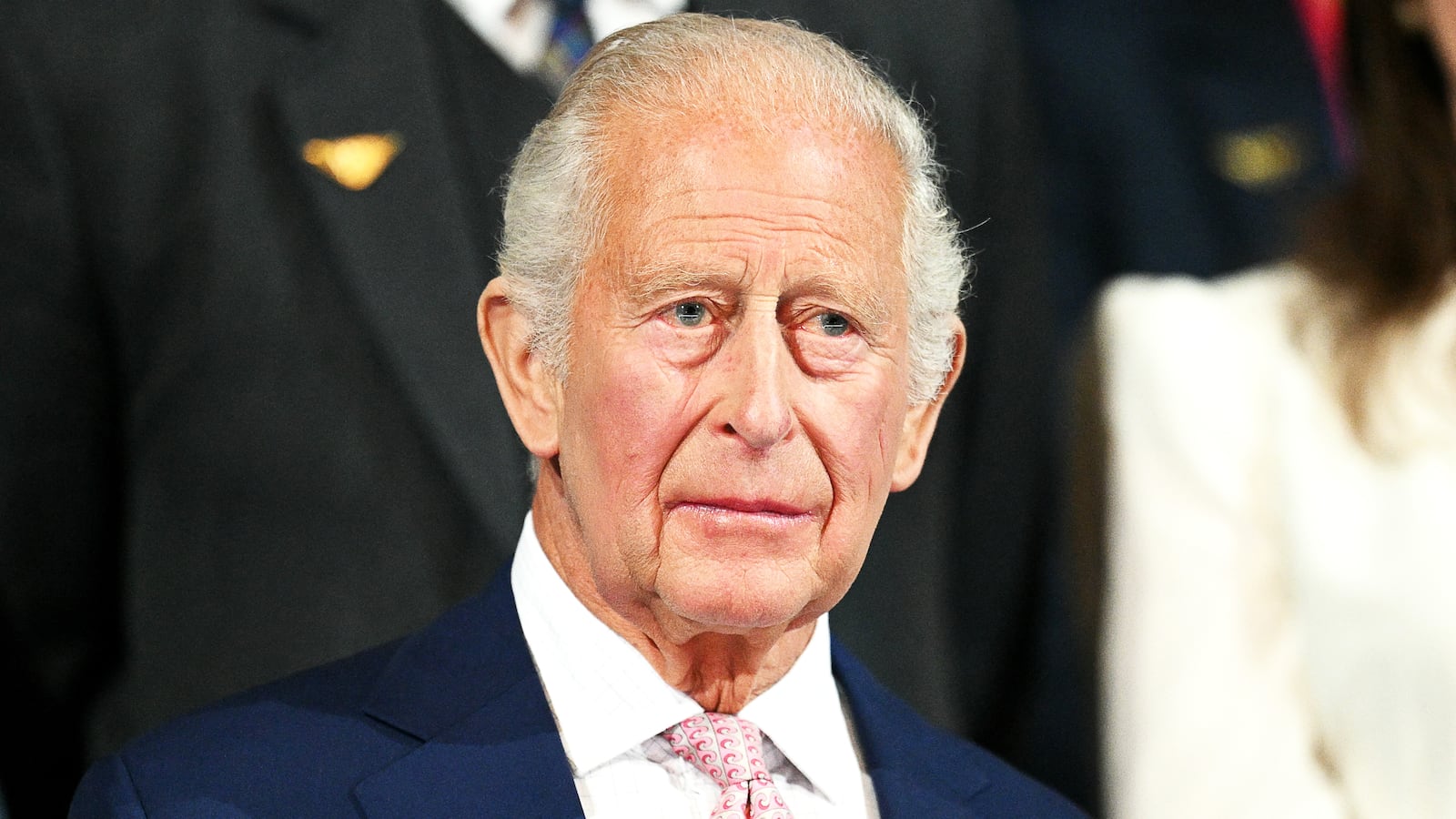 Britain's King Charles III stands for the national anthem during the opening ceremony of the 23rd Commonwealth Games