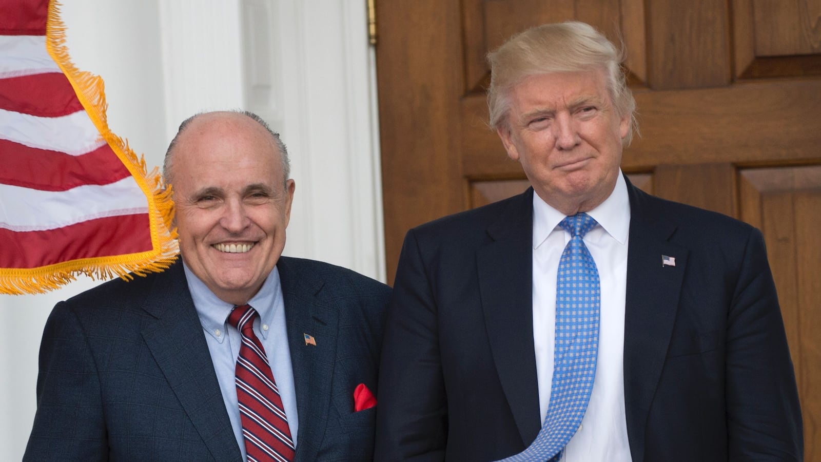 President-elect Donald Trump meets with former New York City Mayor Rudy Giuliani at the clubhouse of Trump National Golf Club November 20, 2016 in Bedminster, New Jersey. / AFP / Don EMMERT (Photo credit should read DON EMMERT/AFP via Getty Images)