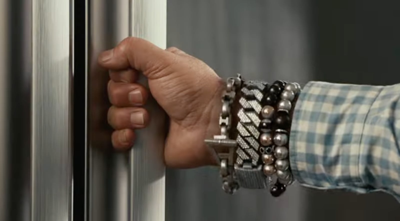 Guy Fieri mid-transformation from "Just a guy" to Guy.