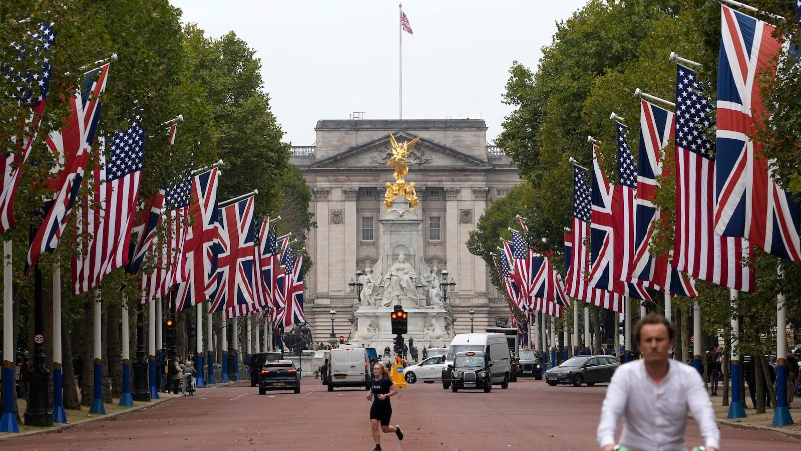 Union and Stars and Stripes flags fly on The Mall, on September 18, 2025, during the second State Visit of US President Donald Trump. After the royal hospitality and pageantry, US President Donald Trump's unprecedented second state visit to the UK takes a serious turn on Thursday when he is hosted by Prime Minister Keir Starmer for wide-ranging talks. (Photo by CARLOS JASSO / AFP) (Photo by CARLOS JASSO/AFP via Getty Images)